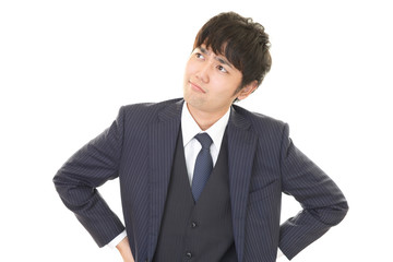 悩むビジネスマン