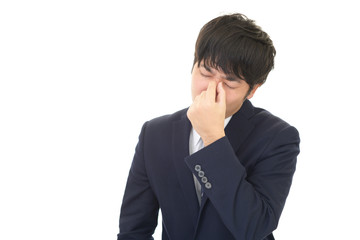 疲れた様子のビジネスマン