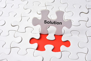 Fototapeta premium SOLUTION concept on missing puzzle