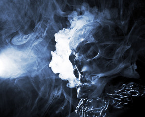 front of real skull in abstract smoke - 107653655