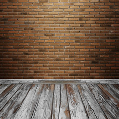 room interior with brick wall and wood floor
