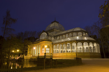 Fototapeta na wymiar Crystal Palace (Palacio de cristal) in Retiro Park, Madrid