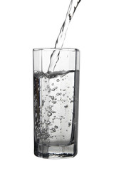 Water pouring into glass, air bubbles in the water, closeup, iso