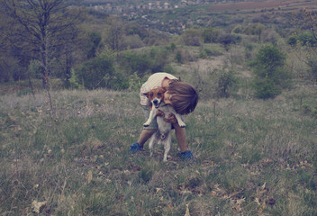 Boy and dog games together / Bulgaria