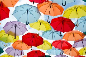 Colorful umbrellas floating