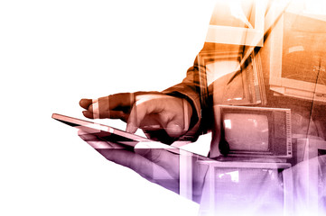 Double exposure of Business Man use Mobile Tablet with Televisio