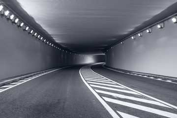 Long underground tunnel with bright lights