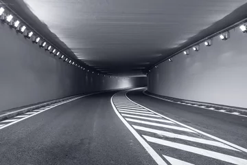 Cercles muraux Tunnel Long tunnel souterrain avec des lumières vives
