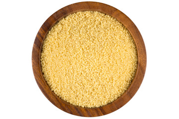 Raw couscous in a wooden bowl