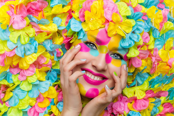 Obraz na płótnie Canvas Girl face in flower petals