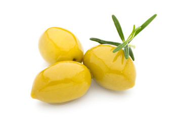 Olives on leaves isolated on white.