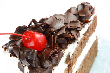 Cake is a form of sweet dessert and typically baked