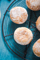 Homemade fresh donuts on cooling tray