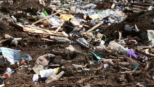 Garbage dump household waste, plastic bags and bottles
