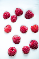 Yoghurt background with raspberries, copy space template