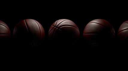 Five Basketballs on black background. Clipping Path.