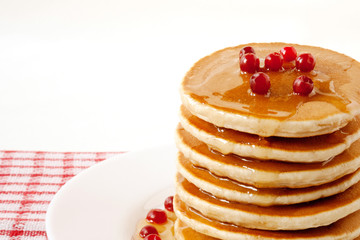 Pancakes with maple syrup and cranberries. Pancake's Day 