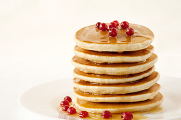 Pancakes with maple syrup and cranberries. Pancake's Day 
