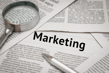 marketing analysis concept with business newspaper