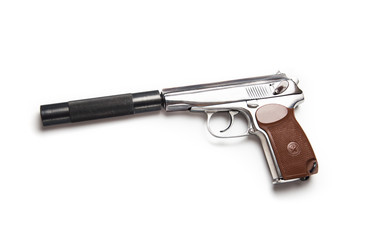 Silver makarov pistol with blacksilencer in hand aiming the target isolated on the white background