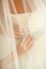 the bride put on a wedding dress