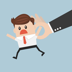 Big hand holding tiny businessman