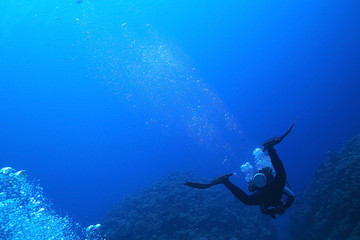 Naklejka na ściany i meble One diver underwater