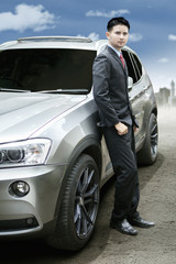 Fototapeta na wymiar Successful entrepreneur and new luxury car