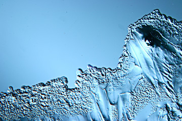 abstract blue background cold ice texture with cracks