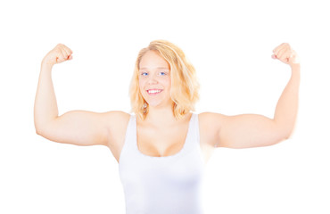 Fototapeta premium Young girl showing her muscles