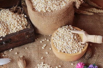 raw the barley on wood background.