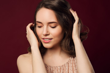 Romantic Beauty Portrait. Healthy wavy brown hair and perfect ho