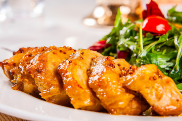 Chicken breast and salad with mixed greens