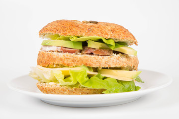Sandwich with cheese, avocado, sirloin and lettuce