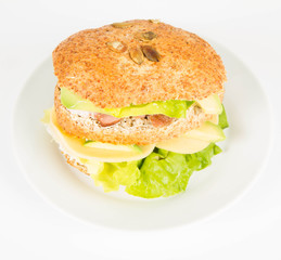Sandwich with cheese, avocado, sirloin and lettuce