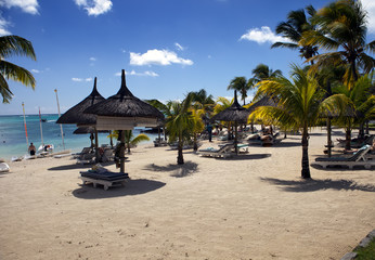 Sun protection umbrellas, beach, sea. Mauritius..
