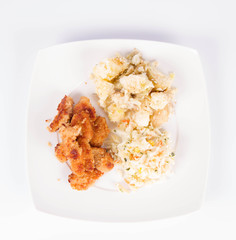Deep fried chicken, potatoes and salad