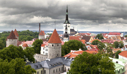 Obraz premium View of Old city's roofs under the storm sky. Tallinn. Estonia.