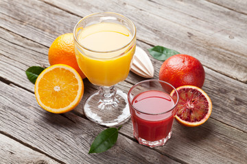 Fresh ripe citruses and juice. Lemons, limes and oranges