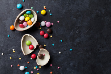 Fototapeta na wymiar Colorful candies and chocolate egg