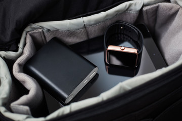 Smart wrist watch and powerbank charger in travel bag