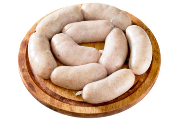 Homemade meat raw sausage on a wooden board