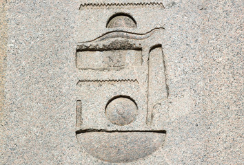 Egyptian hieroglyphics on the ancient granite slabs