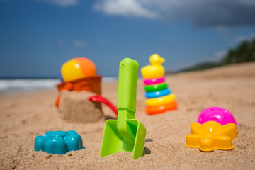 Fototapeta na wymiar Beach toys in the sand at the beach