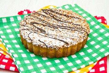  chocolate tart on a wooden board