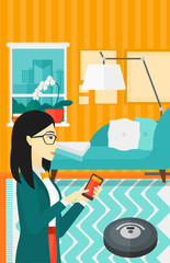 Woman with robot vacuum cleaner.