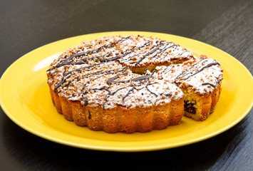 chocolate tart on a wooden board