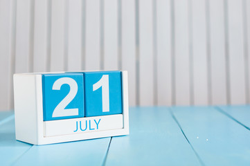 July 21st. Image of july 21 wooden color calendar on white background. Summer day. Empty space for text