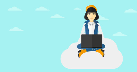 Woman working on laptop.