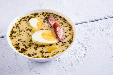 Sour soup with eggs. - obrazy, fototapety, plakaty